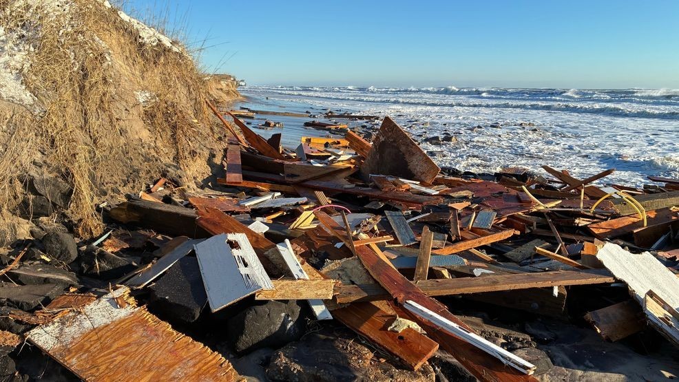 Debris from collapsed homes litter the shoreline in the Outer Banks village of Buxton, N.C., Feb. 2, 2026. (National Park Service via AP)