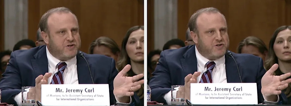 Man in a suit with a tie speaks passionately at a hearing. Nameplate reads "Mr. Jeremy Carl" as nominee for a Secretary role in International Organizations