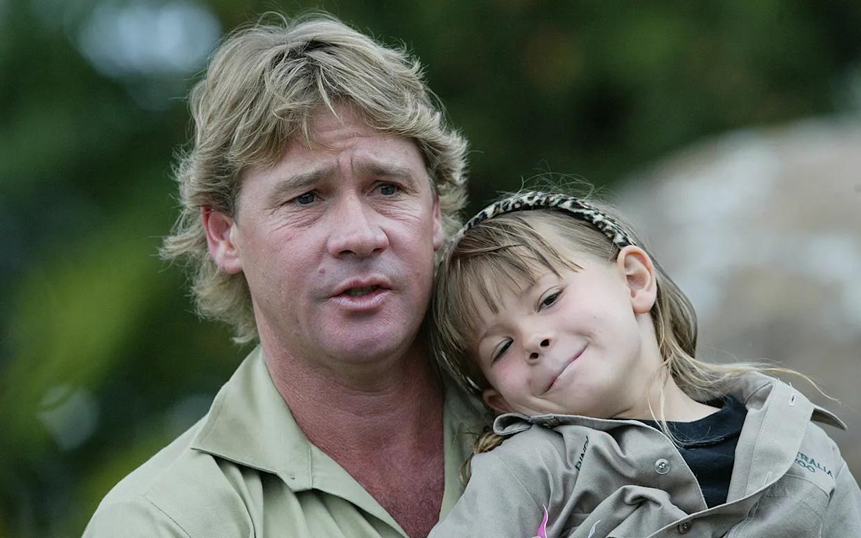 Steve Irwin holding a young Bindi Irwin