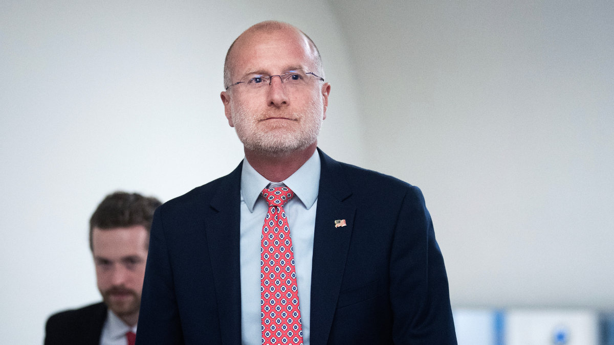 FCC Chairman Brendan Carr walks in a hotel in New York