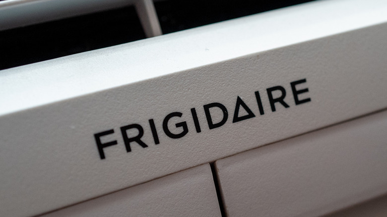 A close-up image of a Frigidaire logo on an appliance