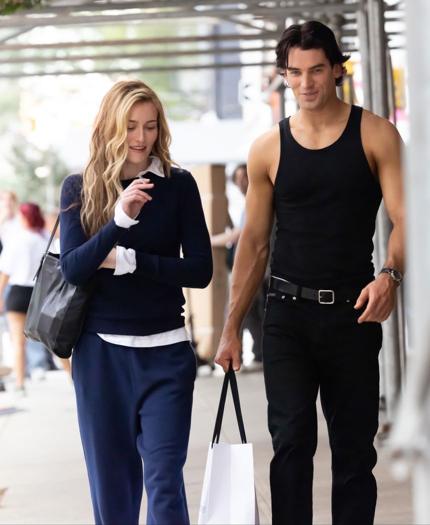 A sweater and sweatpants, with a wrinkled white shirt that suggests CBK sorta tried.