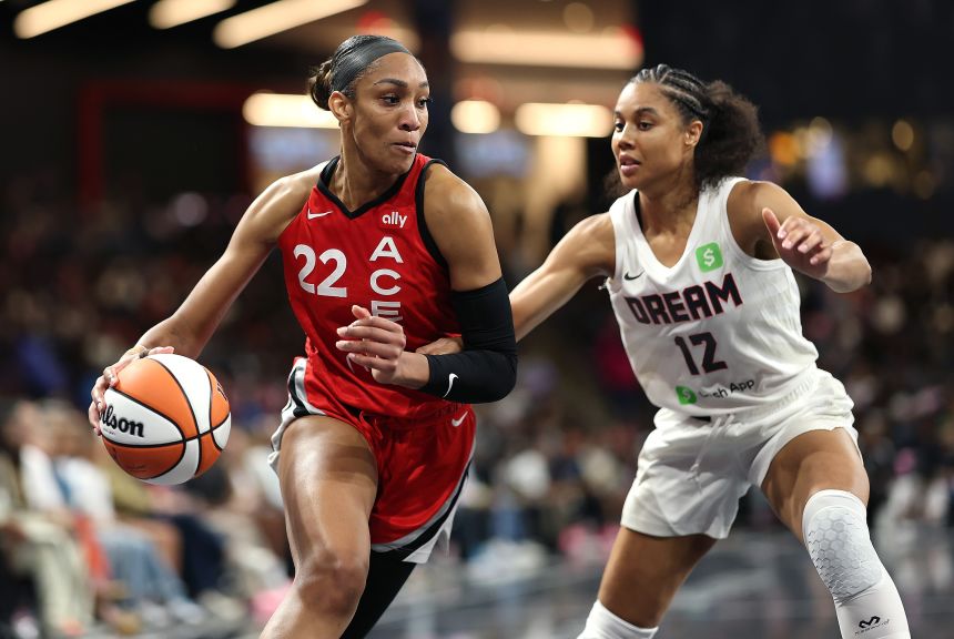 A'ja Wilson drives against Atlanta Dream forward Nia Coffey on August 27.
