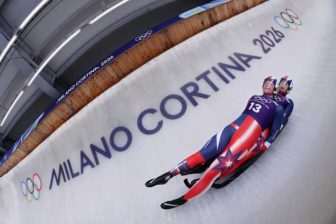 Luge - Milano Cortina 2026 Winter Olympics: Day 2 CORTINA D'AMPEZZO, ITALY - FEBRUARY 08: Marcus Mueller and Ansel Haugsjaa of Team United States compete in the Men's Doubles Official Training Run 1 on day two of the Milano Cortina 2026 Winter Olympic games at Cortina Sliding Centre on February 08, 2026 in Cortina d'Ampezzo, Italy. (Photo by Richard Heathcote/Getty Images)