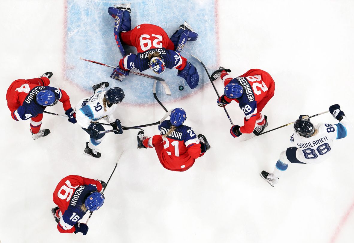 Hockey players from the Czech Republic and Finland compete during a preliminary round game on Sunday, February 8. The Czechs won 2-0.