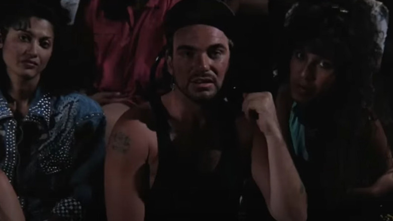 Billy Bob Thornton as Dave sitting in the audience during a comedy show in Going Overboard