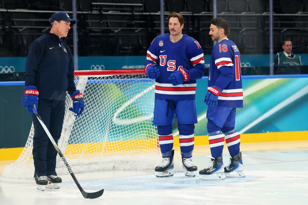 Head coach Mike Sullivan, JT Miller, and Vincent Trocheck of Team United States talk during ice hockey training.