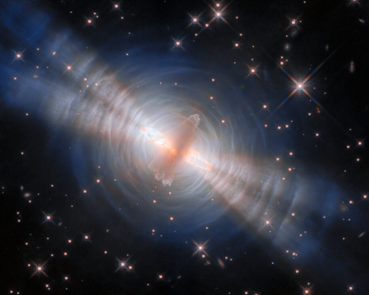 Hubble captures light show around rapidly dying star