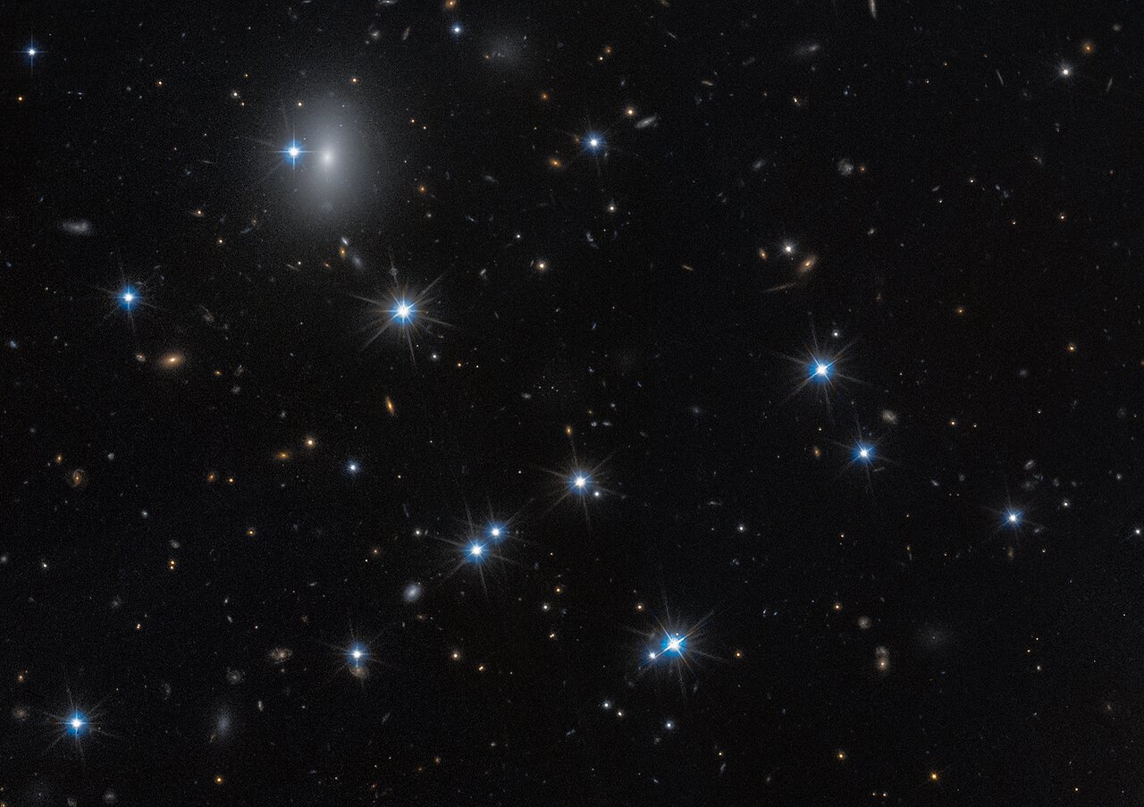 Hubble identifies one of darkest known galaxies