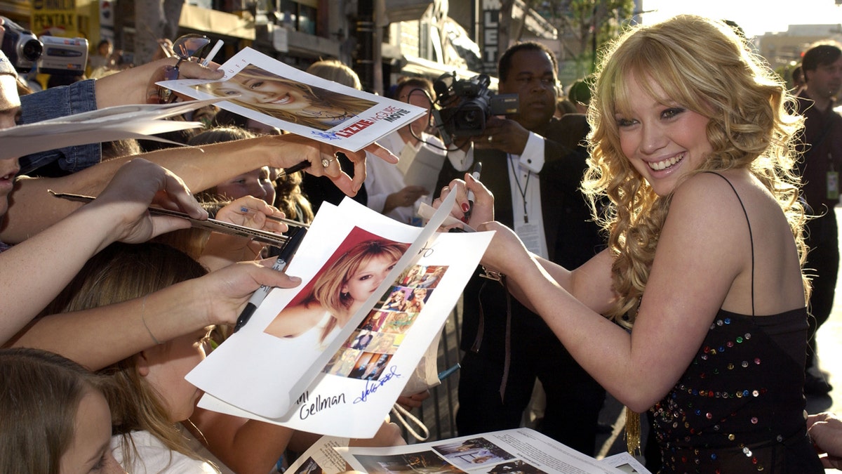 Hilary Duff arriving at a film premiere at The El Capitan Theater.