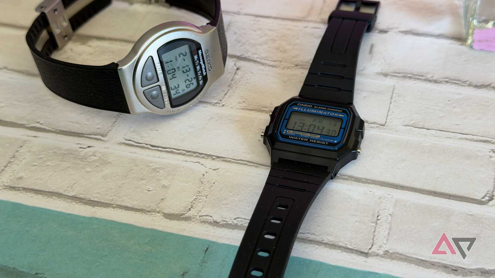 Seiko MessageWatch sitting next to a Casio F-105