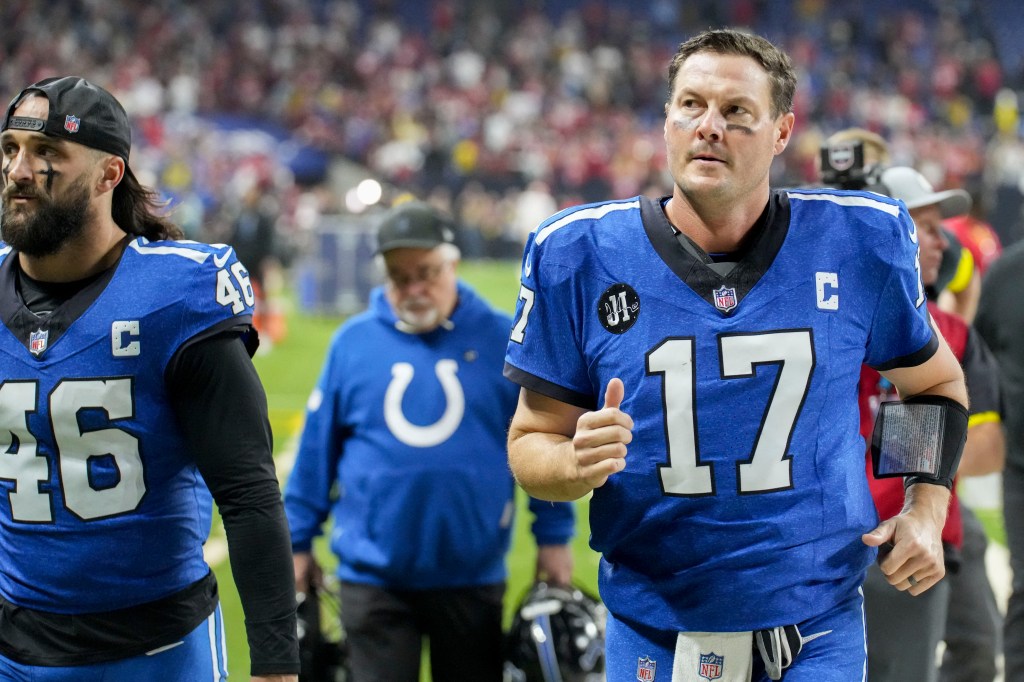 Indianapolis Colts quarterback Philip Rivers (17) leaves the field after losing a game against the San Francisco 49ers at Lucas Oil Stadium.