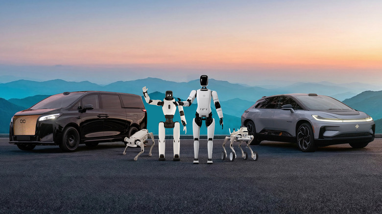 Faraday Future's new humanoid robots standing in front of its rebadged Chinese minivan and the EV it pretends to make