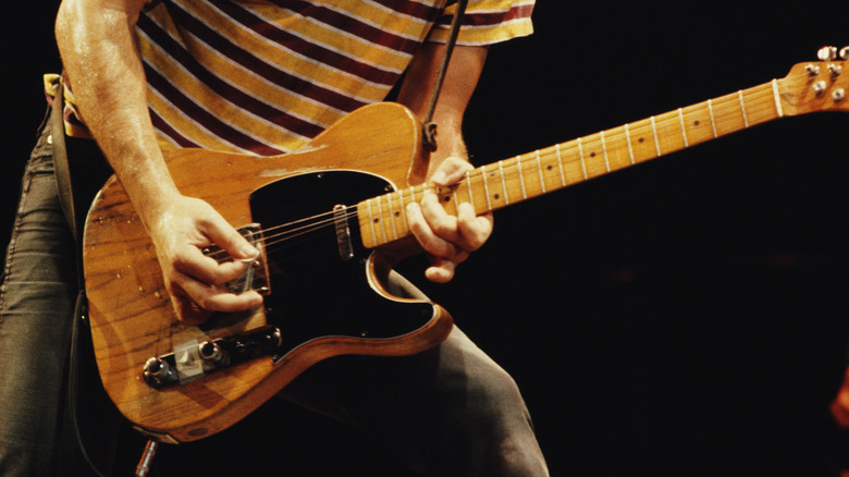 Close-up on Bruce Springsteen's guitar on stage