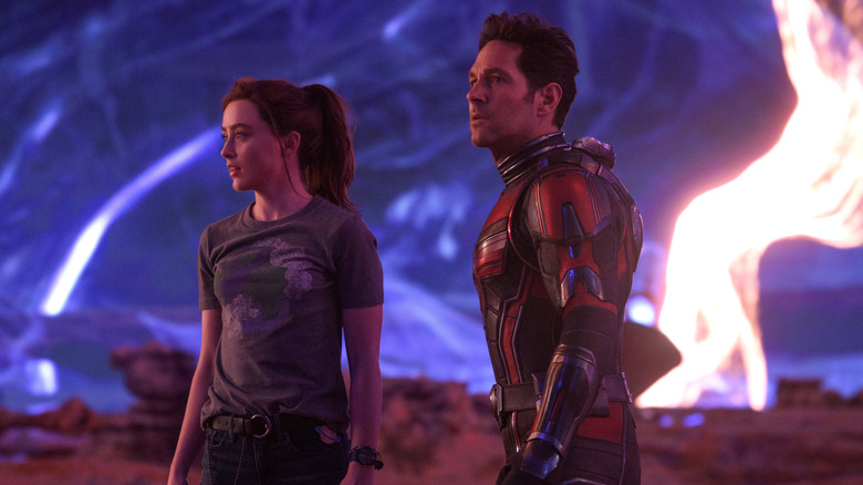 Kathryn Newton as Cassie Lang standing next to Paul Rudd as Scott Lang in the Quantum Realm in Ant-Man and the Wasp: Quantumania