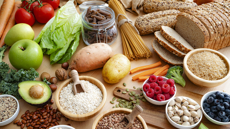 Variety of high fiber foods like whole-grain breads, beans, vegetables, and fruits