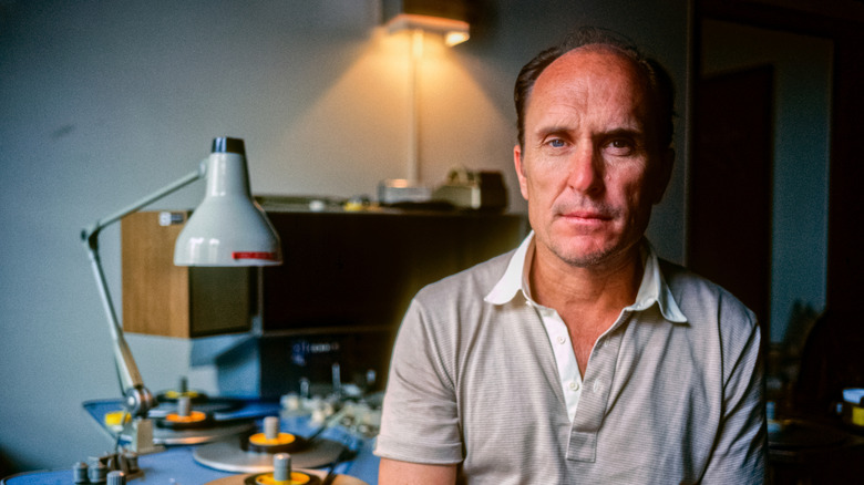 robert duvall posing for camera in recording studio