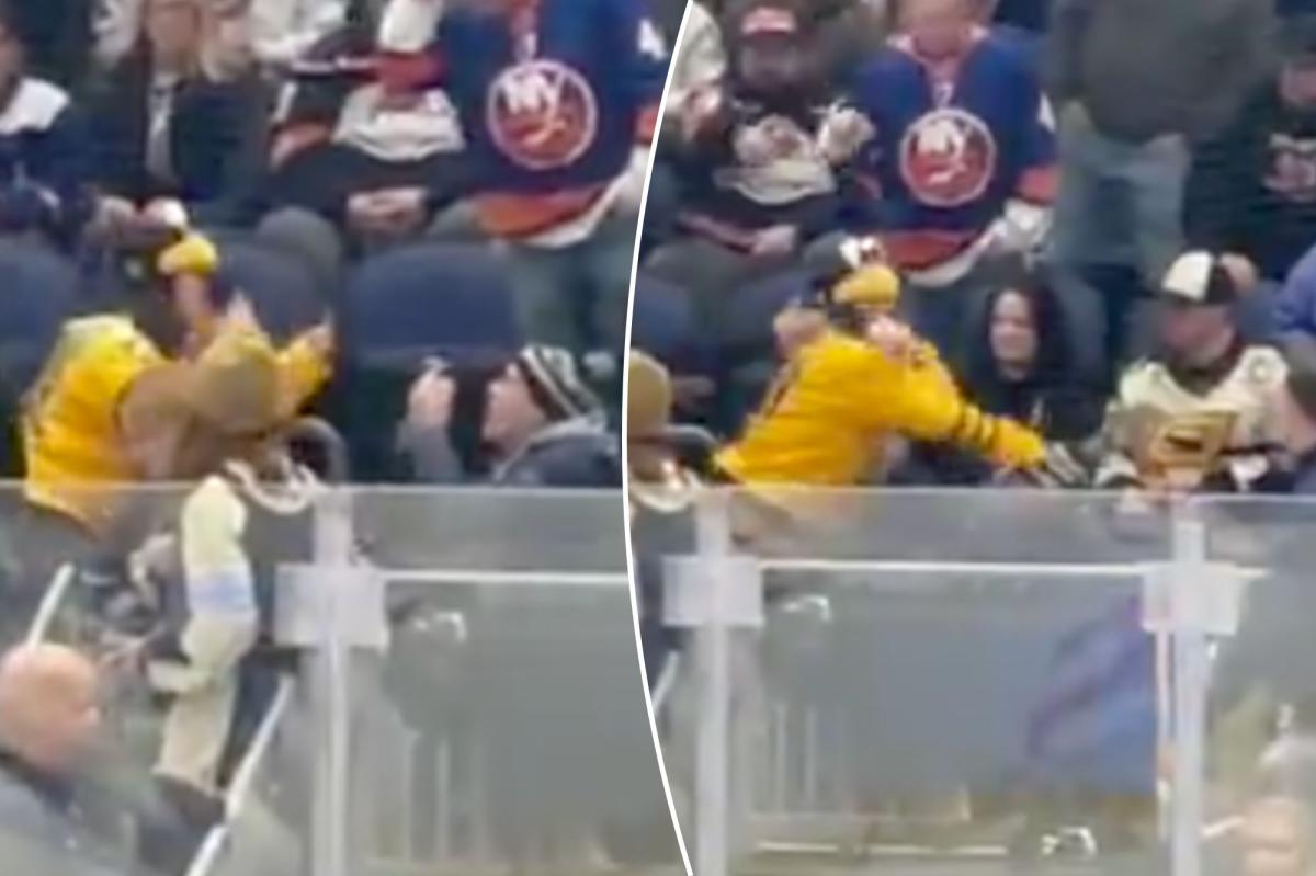 Penguins fan attacks Islanders supporter — while she's already getting kicked out