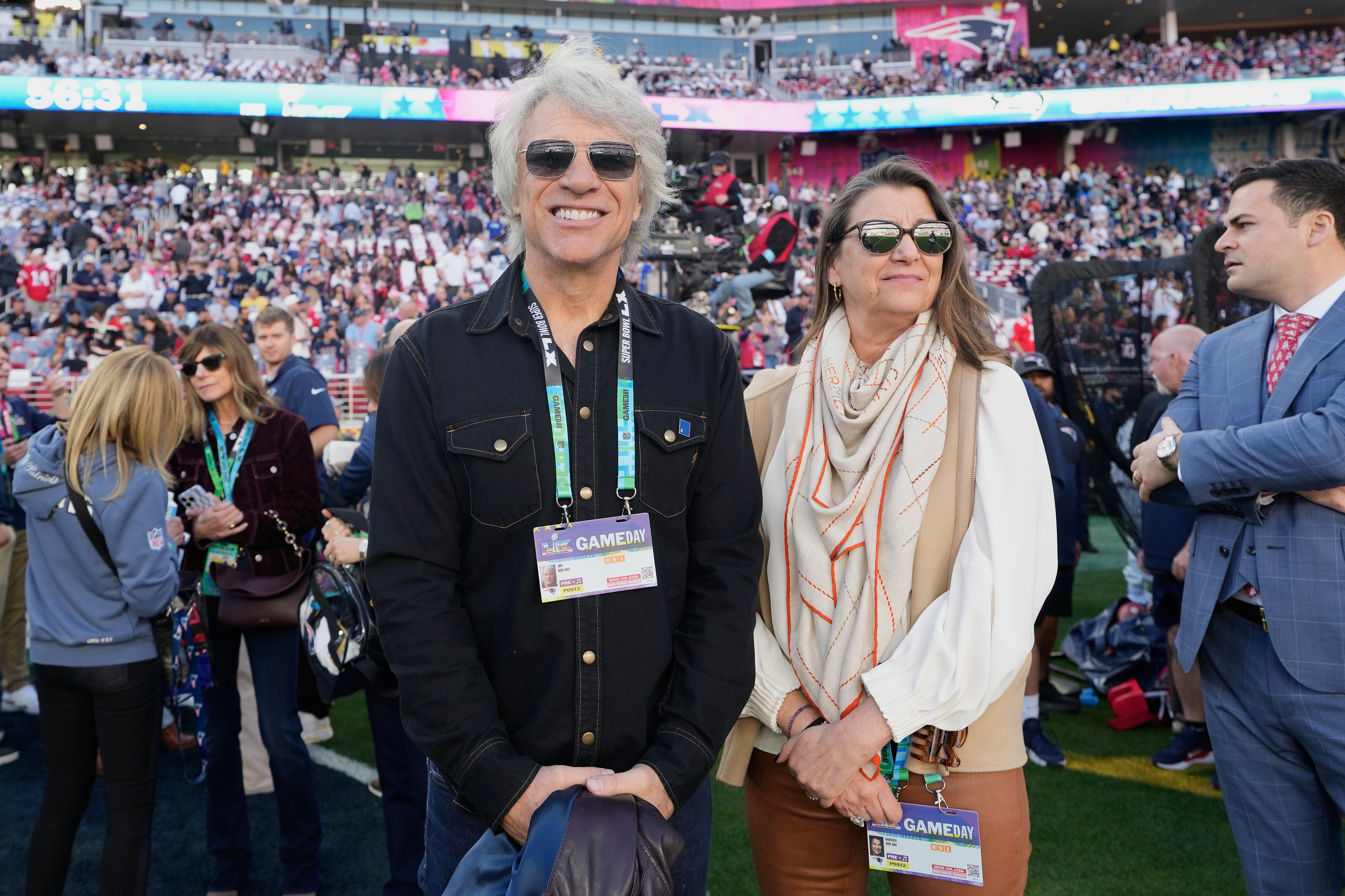 Jon Bon Jovi and wife Dorothea on the field prior to Super Bowl LX between the New England Patriots and the Seattle Seahawks at Levi's Stadium on February 08, 2026 in Santa Clara, California.