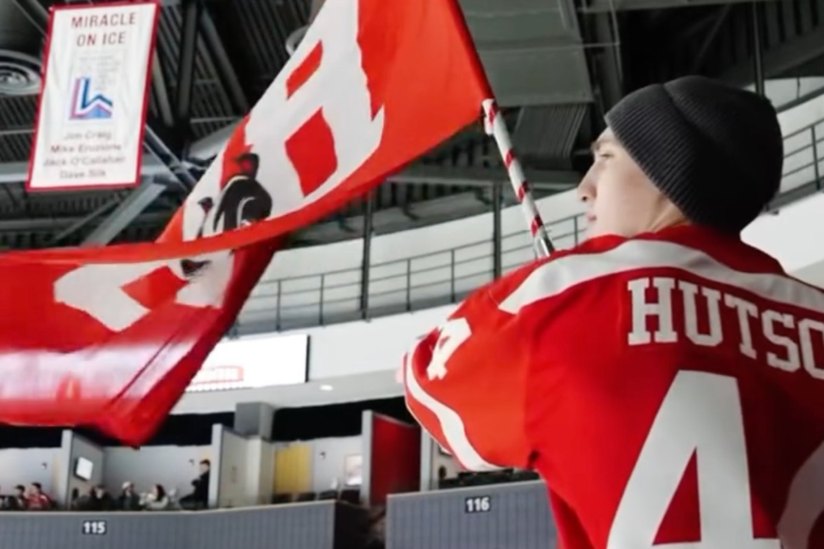 Lane Hutson returns to BU in brother Cole’s jersey, waves flag in Terriers’ overtime win