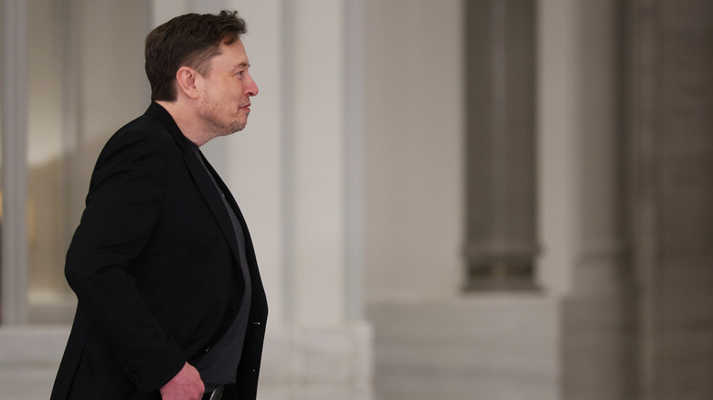 Elon Musk attends a state dinner at the Lusail Palace on May 14, 2025, in Doha, Qatar.