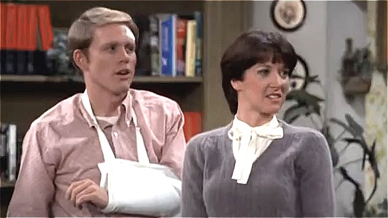 Richie Cunningham stands next to Lori Beth
