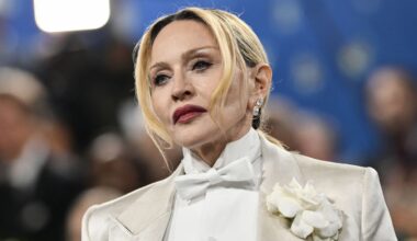 Madonna Wows in Tiny Lace Minidress Zipped Down to Ribs and Fishnets