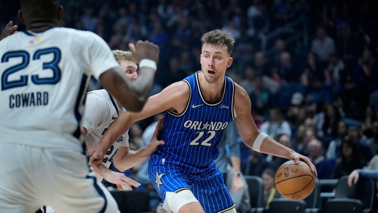 Magic forward Franz Wagner (22) scored 18 points as Orlando defeated the Memphis Grizzlies in his hometown of Berlin on Thursday, Jan. 15, 2026. (AP Photo/Ebrahim Noroozi)