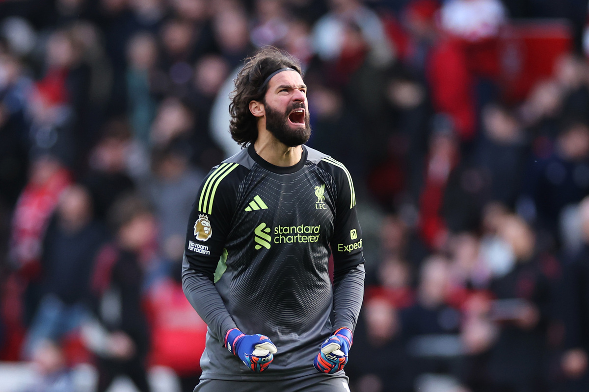 NOTTINGHAM, ENGLAND - FEBRUARY 22: Alisson Becker of Liverpool celebrates after Alexis Mac Allister of Liverpool (not pictured) scores his team's first goal during the Premier League match between Nottingham Forest and Liverpool at City Ground on February 22, 2026 in Nottingham, England. (Photo by Dan Mullan/Getty Images)