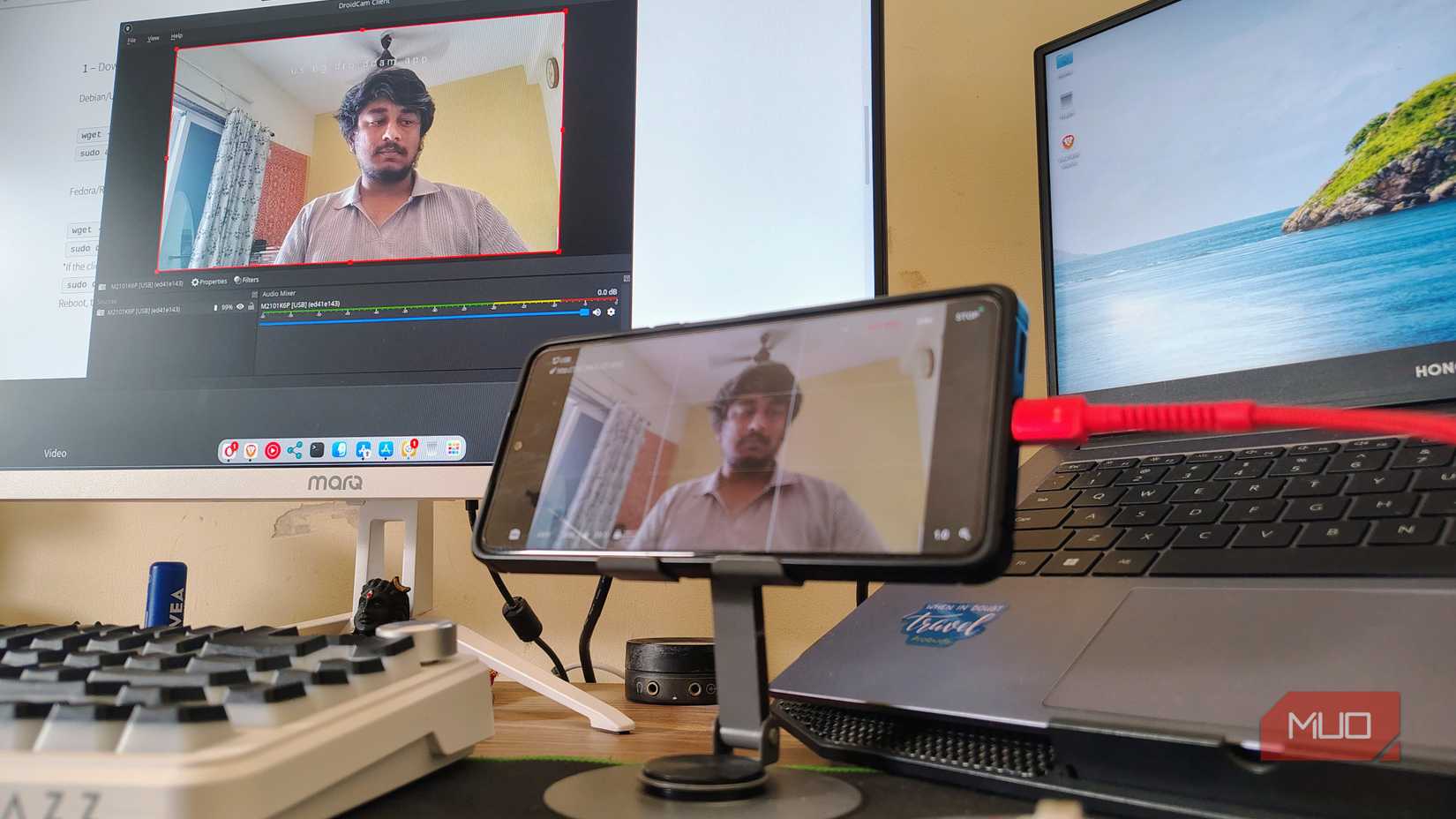 Old Android phone running DroidCam to stream camera as webcam