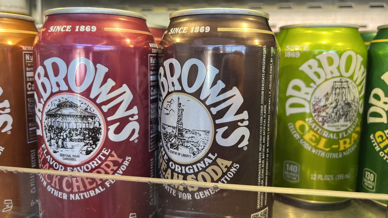Variety of Dr. Brown's soda in refrigerator case