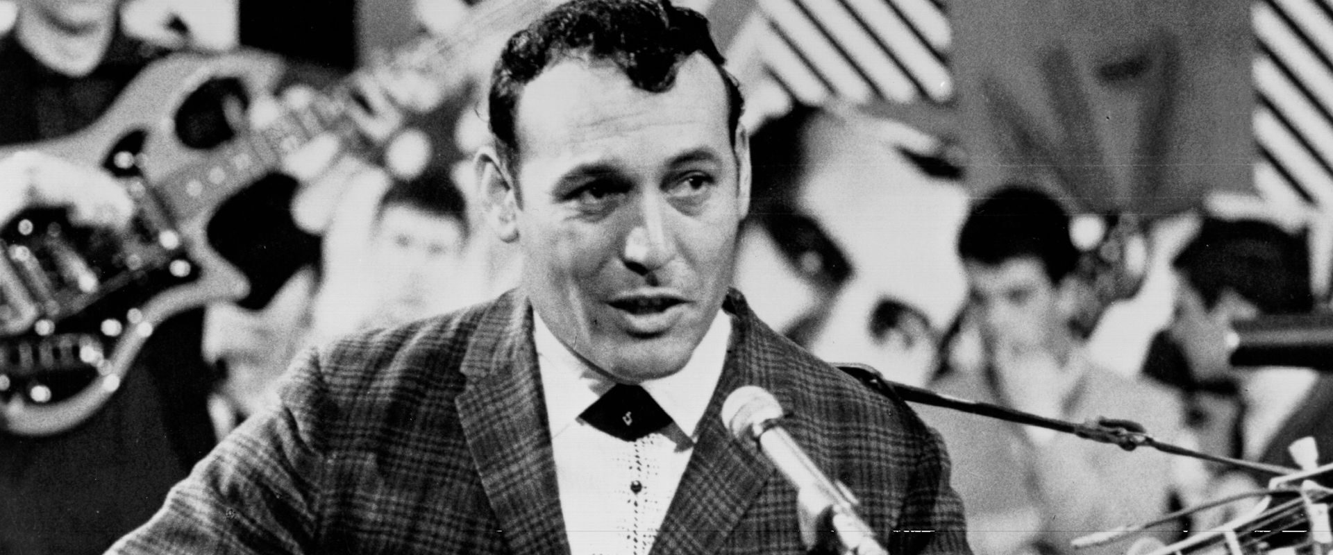 Carl Perkins performing in 1965