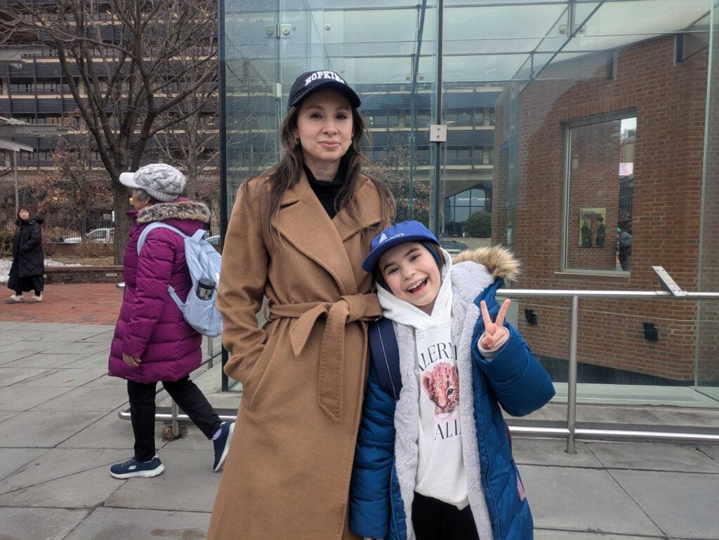 Christina Raymond and her daughter posing for a photo at Independence Mall