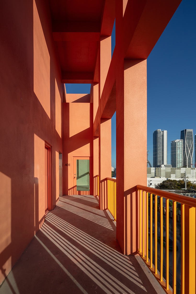 gridded peach residential facade rethinks affordable housing in miami