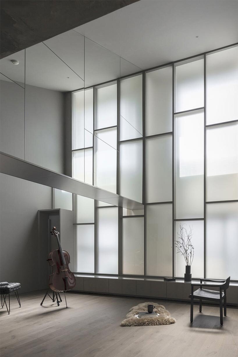 geometric frosted glass screens filter daylight within renovated room 1101 osaka apartment