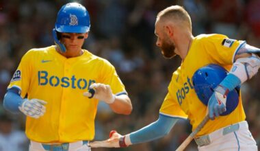 Boston Red Sox left fielder Roman Anthony (19) gets a hand from BBoston Red Sox shortstop Trevor Story (10) as he scores during the fourth inning. The Boston Red Sox host the Tampa Bay Rays Saturday, July 12, 2025 at Fenway Park in Boston, MA.