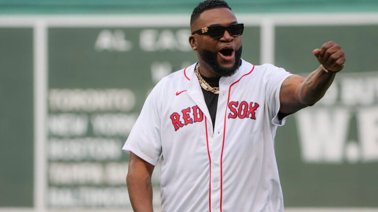 Boston Red Sox David Ortiz pumps his fist before throwing out the ceremonial first pitch before they play the New York Yankees during MLB action on Saturday September 13, 2025.