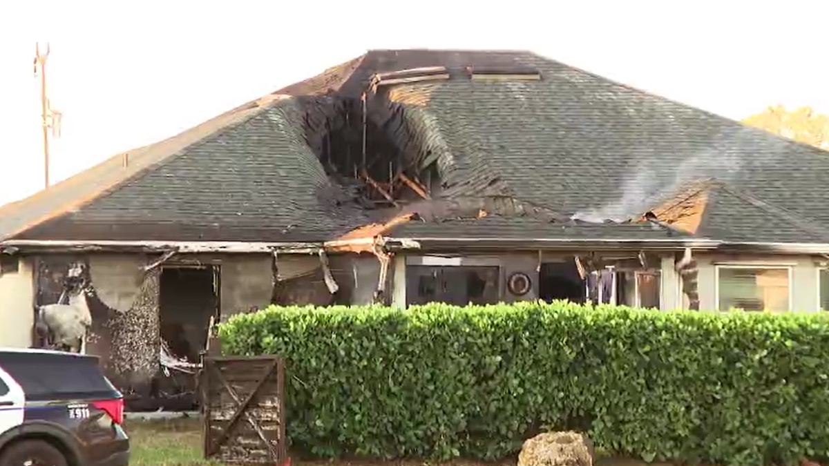 Crews battle Cape Coral house fire Monday morning