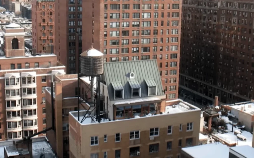 This US architect built a $200,000 home on top of a NYC skyscraper, turning a janitor’s apartment into a rooftop chalet he’s lived in for 28 years