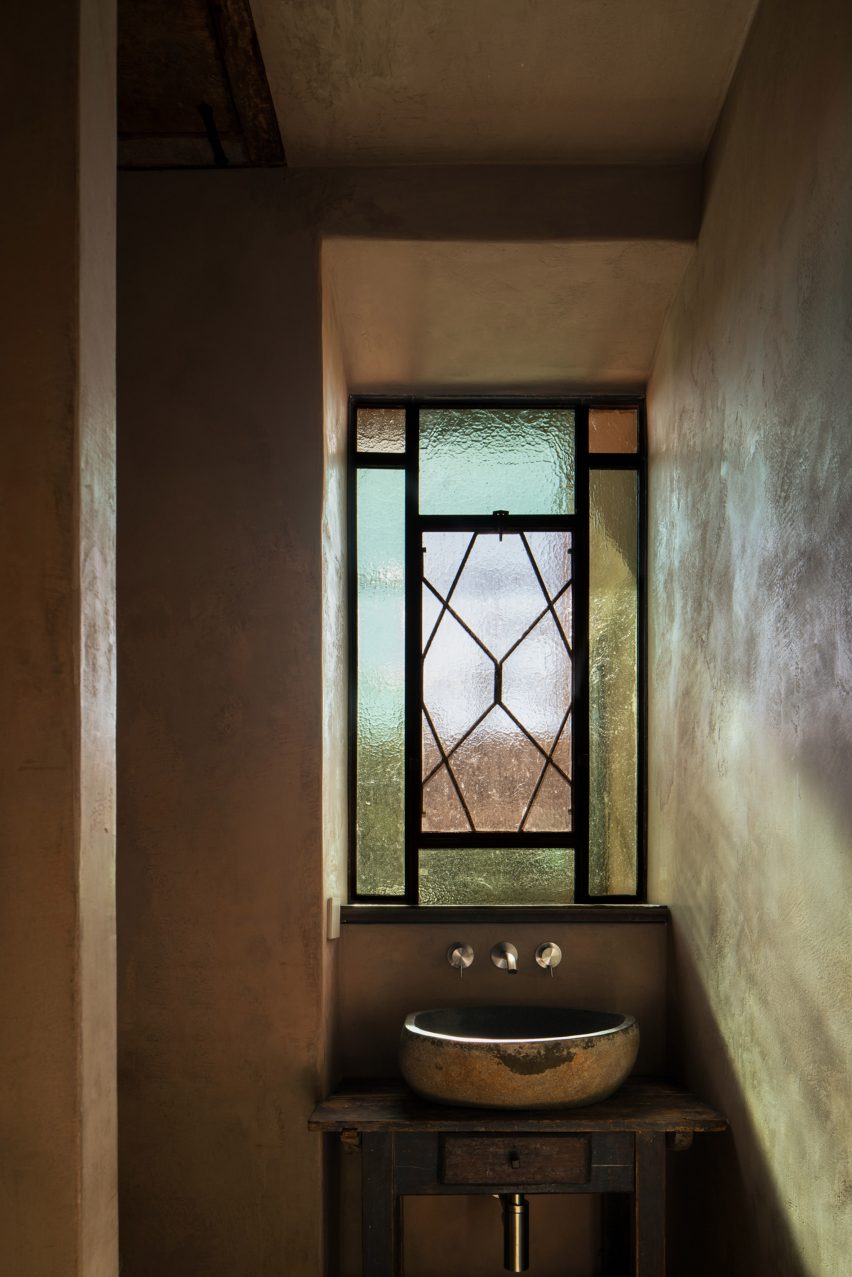 Bathroom with a stained glass window