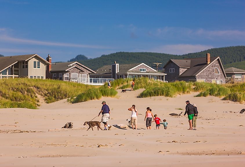 A family on a beach in Manzanita, Oregon.