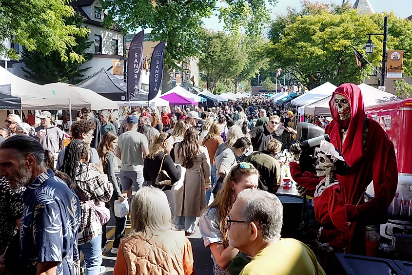 People crowd the streets of a Halloween street fair in Sleepy Hollow, New York.