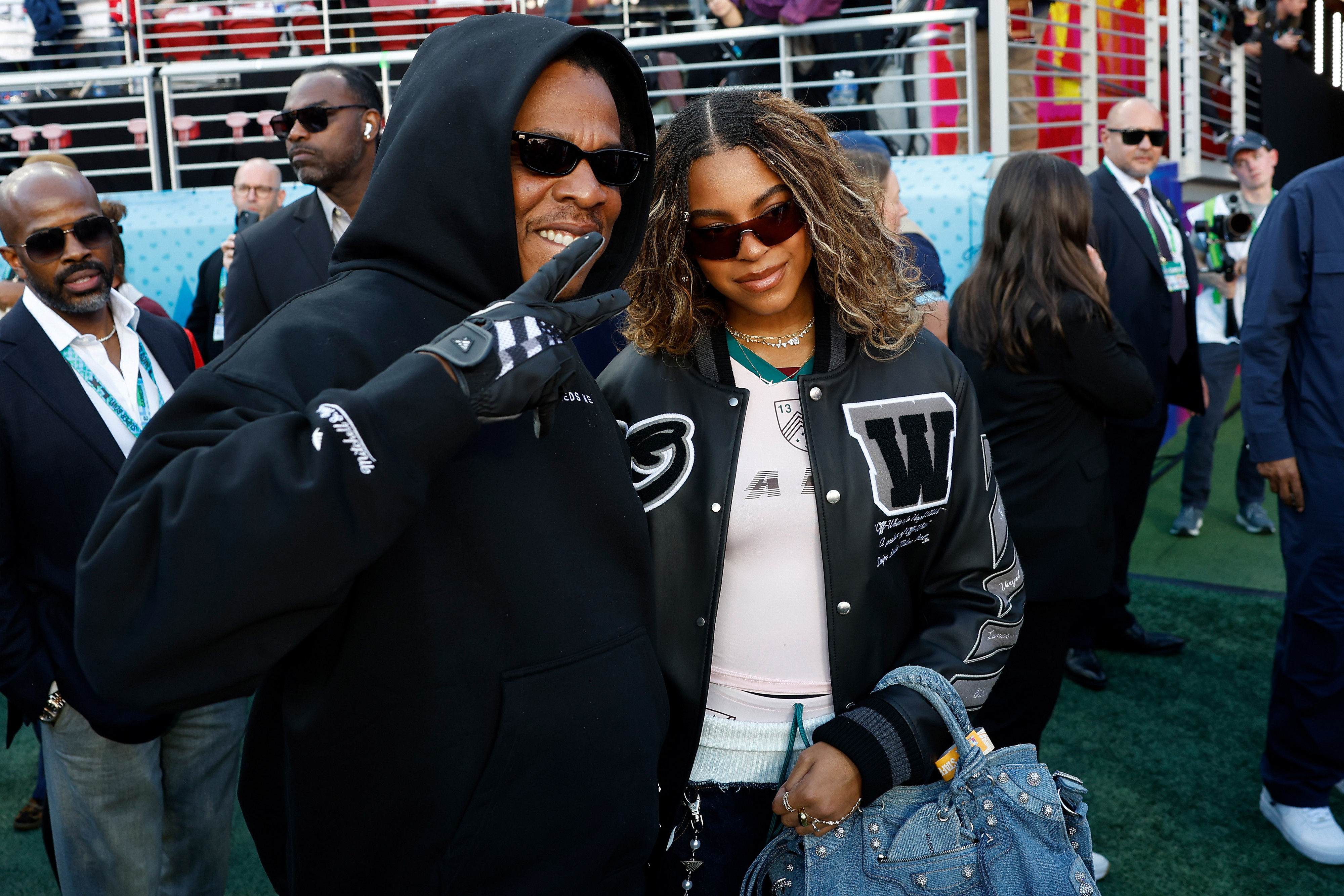 Jay-Z and Blue Ivy Carter on the field prior to Super Bowl LX between the New England Patriots and the Seattle Seahawks at Levi's Stadium on February 08, 2026 in Santa Clara, California.