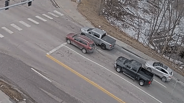 Road collapse caught on video as 2 vehicles sink near University of Nebraska