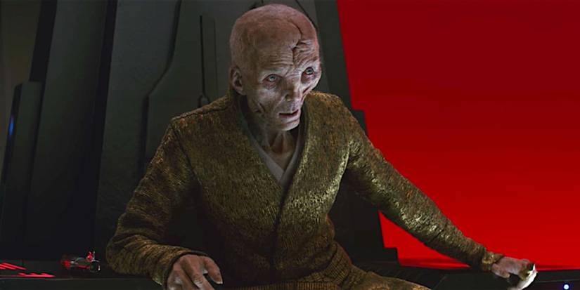 Supreme Leader Snoke, played by Andy Serkis, sits on a chair in Star Wars: The Last Jedi.