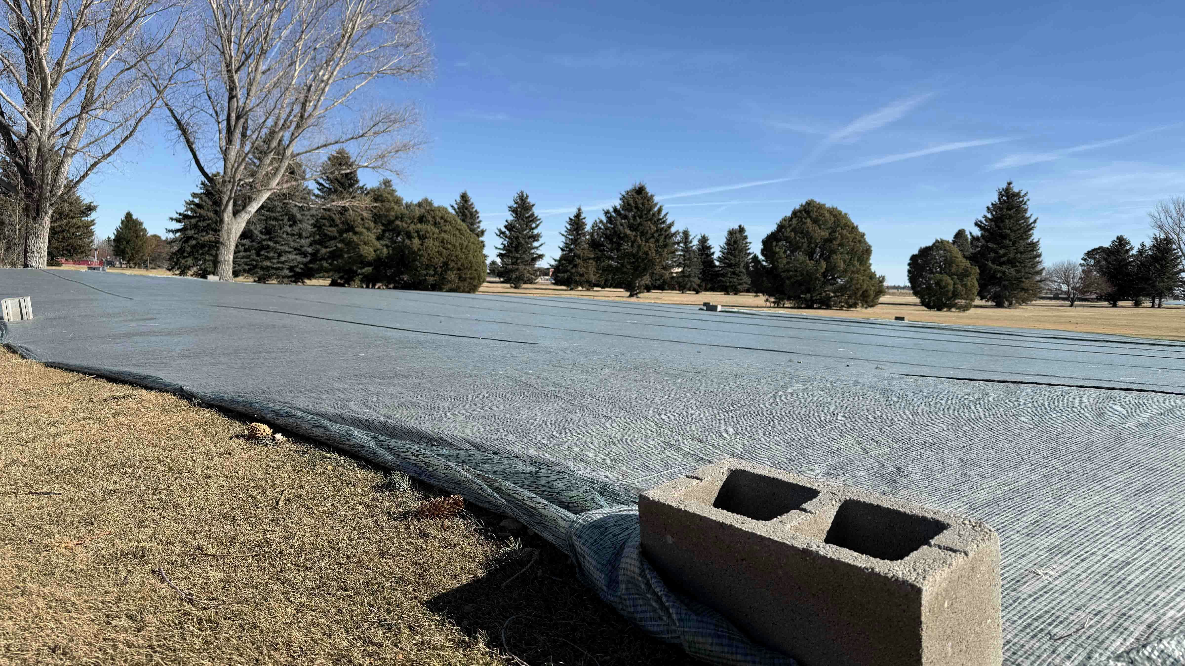 Tarps placed on the greens at the Airport Golf Course in Cheyenne