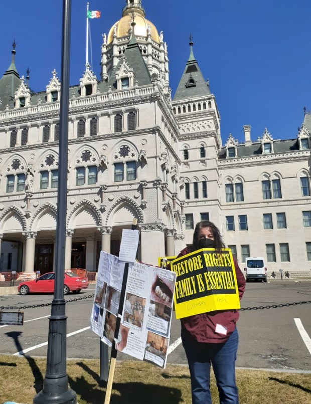 Irma Rappaport, an Orange resident, is among those fighting for a federal Essential Caregivers Act, which would assure that residents of long-term care can retain the right to in-person access to a designated essential caregiver. She is shown here advocating in Connecticut. (Courtesy)