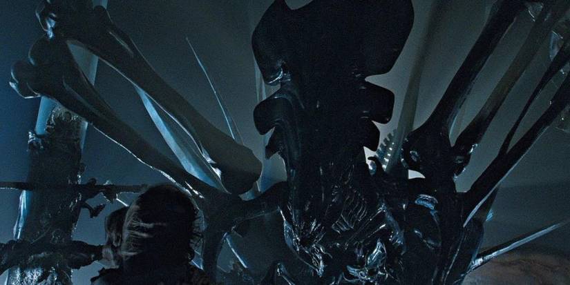 The Alien Queen backlit on a spaceship in Aliens
