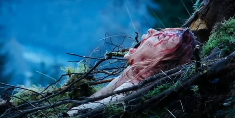 Shauna MacDonald as Sarah, bursting out of the ground in 'The Descent'