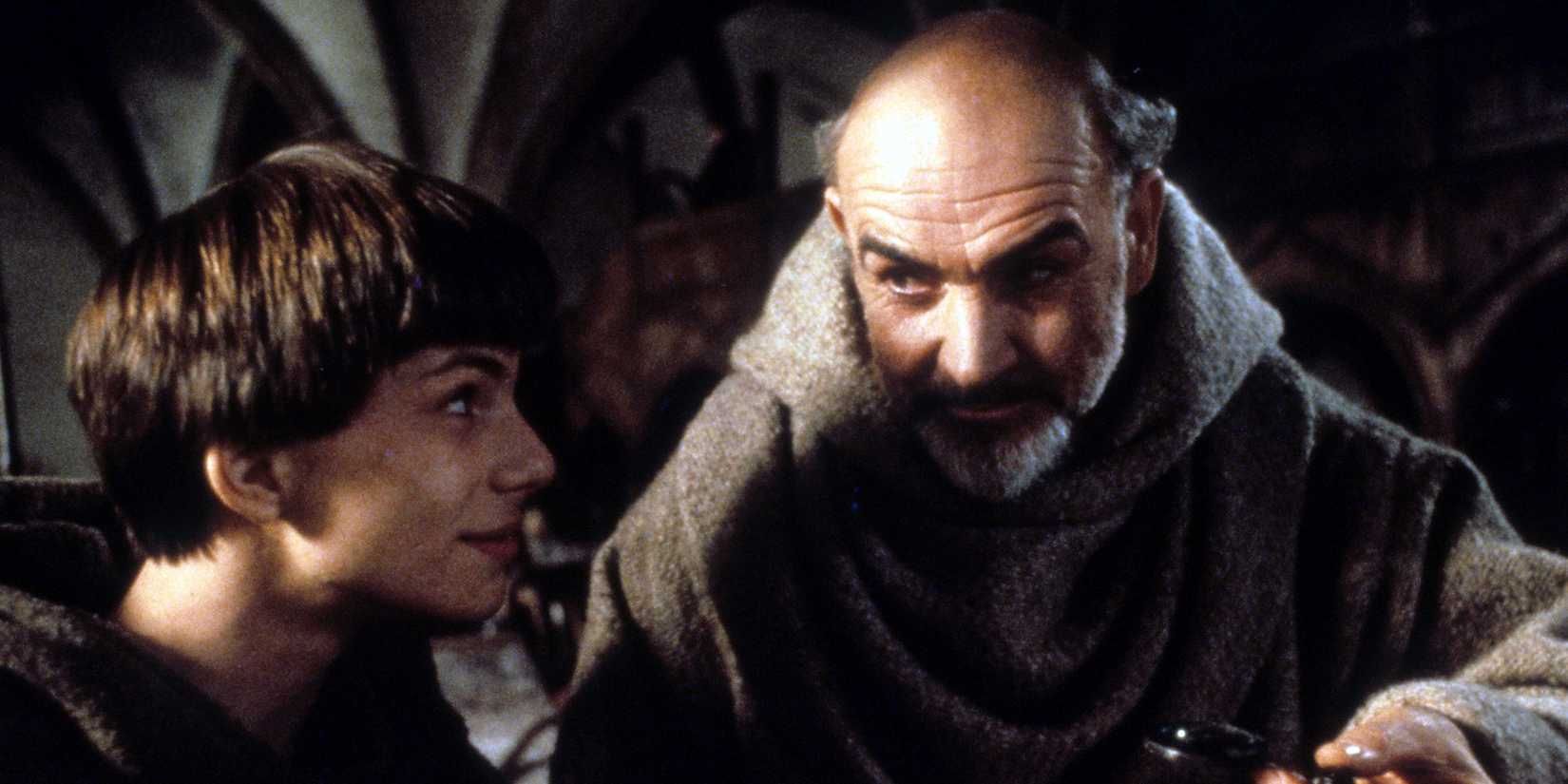 Adso and William looking at each other in The Name of the Rose